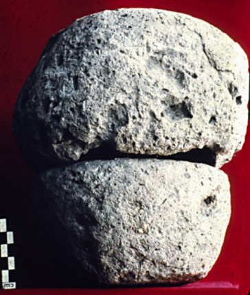 Laboratory photograph of excavated stone bowls of pummice containing early gold worker's tool kit and gold